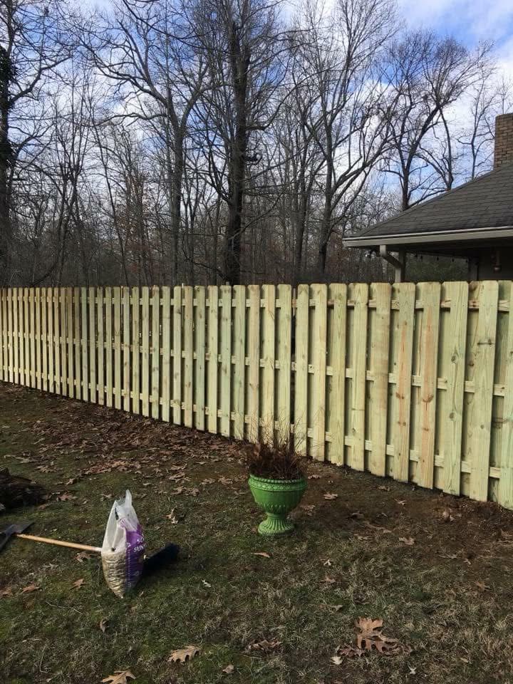 Vinyl fence run along a property line