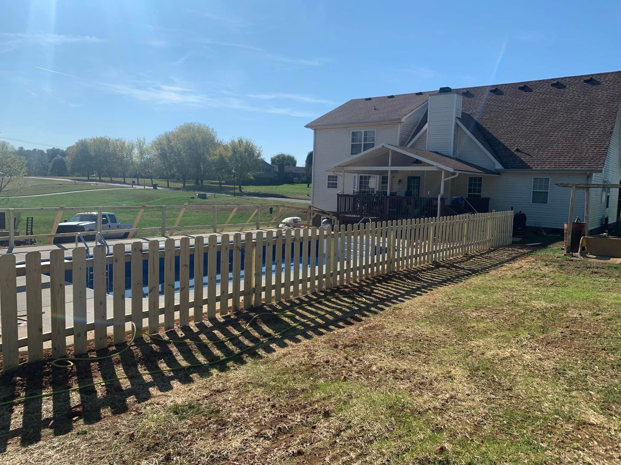 Aluminum fence along a front yard